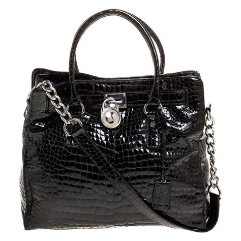 michael kors black patent leather croc gold trim|Michael Kors Scarlett Medium Crocodile Embossed Patent .